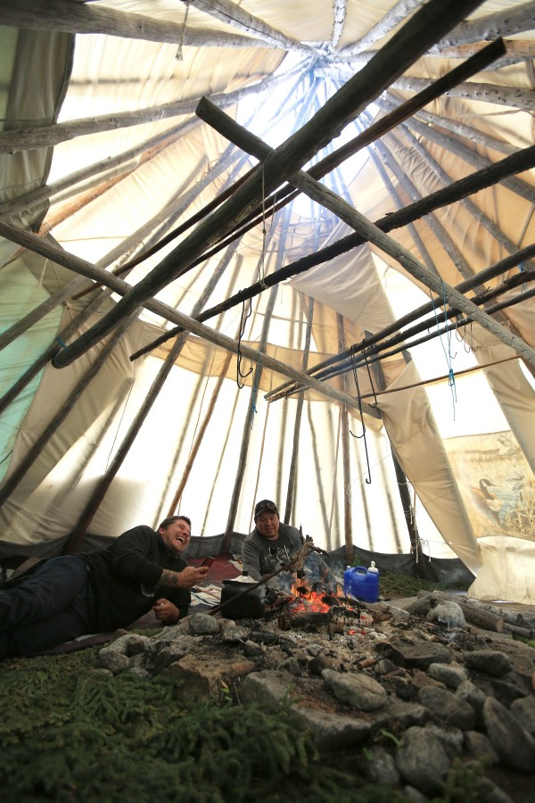 Stéphane Modat and Jerry in the teepee in Chisasibi